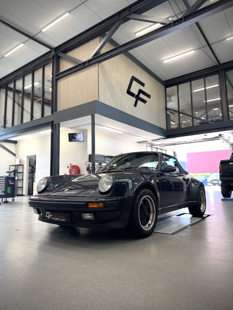 Porsche 911 Carrera Cabriolet met klassieke uitstraling en modern geluid